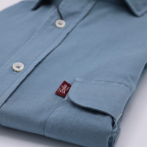 Camisa 2 bolsillos color azul petroleo